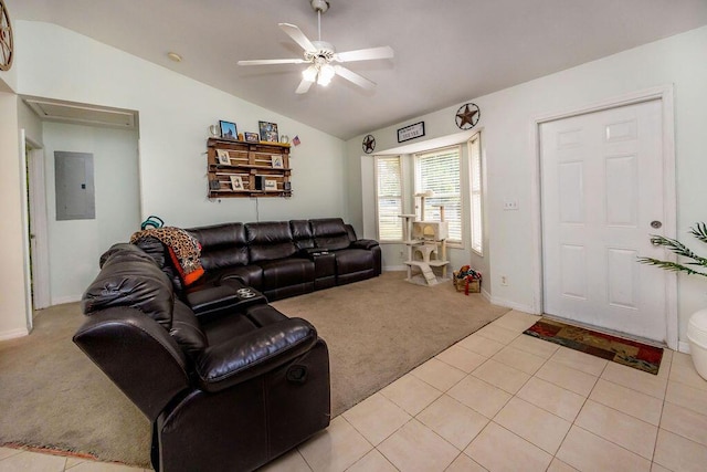 living area with ceiling fan, light carpet, baseboards, lofted ceiling, and electric panel