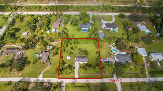 17917 49th St N, Loxahatchee, FL 33470 - aerial perspective of suburban area with property parcel outlined