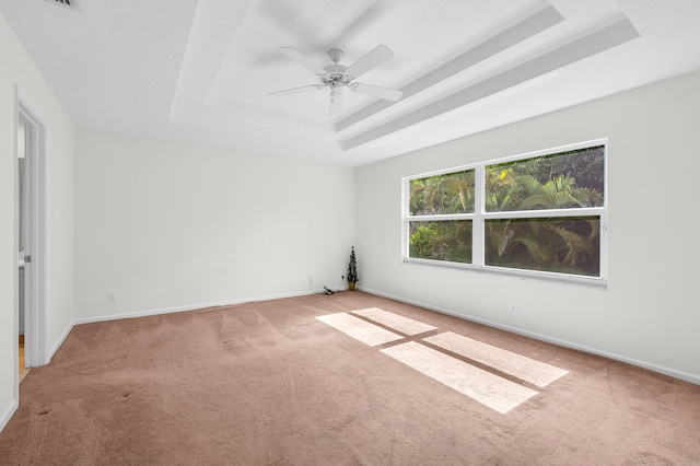 21256 Via Fiore, Boca Raton, FL 33433 - carpeted empty room with a tray ceiling, ceiling fan, and baseboards