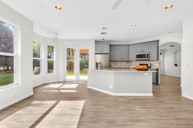 21256 Via Fiore, Boca Raton, FL 33433 - kitchen featuring gray cabinets, stainless steel appliances, healthy amount of natural light, a ceiling fan, and recessed lighting