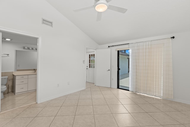 unfurnished bedroom featuring visible vents, high vaulted ceiling, connected bathroom, access to outside, and light tile patterned flooring