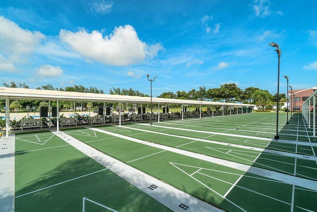 view of property's community with shuffleboard