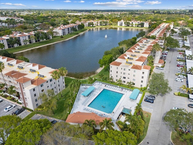 birds eye view of property featuring a water view