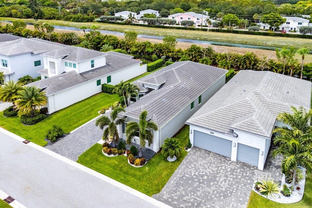 aerial view featuring a water view and a residential view