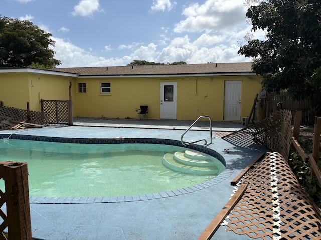 view of pool featuring a fenced in pool and a patio