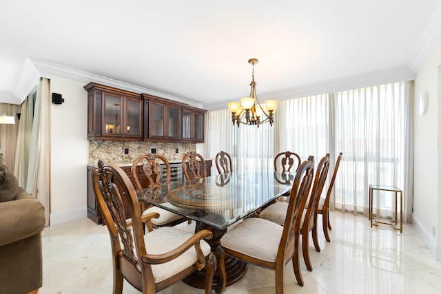 4740 S Ocean Blvd Unit 511, Highland Beach, FL 33487 - dining space with crown molding, marble finish floor, baseboards, and a notable chandelier