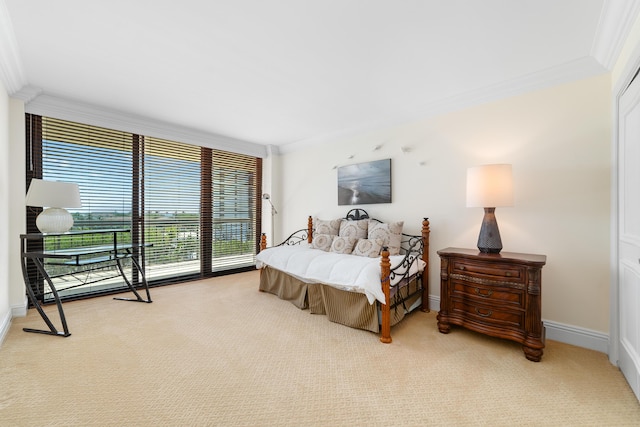 4740 S Ocean Blvd Unit 511, Highland Beach, FL 33487 - bedroom with crown molding, baseboards, and light colored carpet