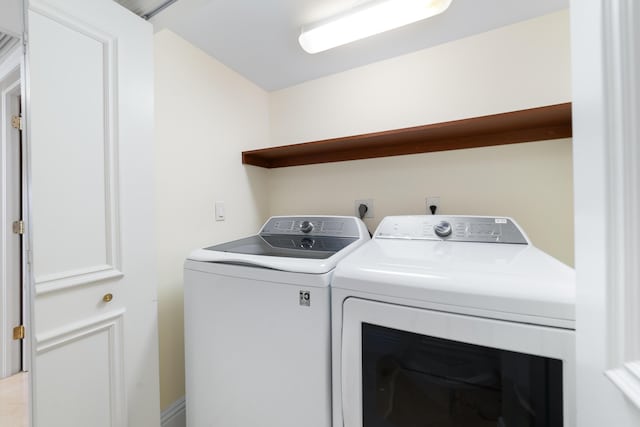 4740 S Ocean Blvd Unit 511, Highland Beach, FL 33487 - laundry room featuring laundry area and washing machine and clothes dryer