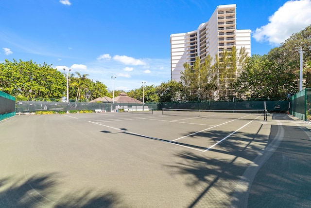 4740 S Ocean Blvd Unit 511, Highland Beach, FL 33487 - view of sport court featuring fence
