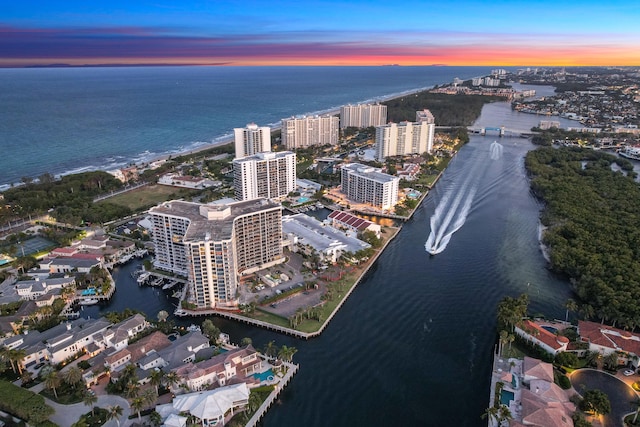 4740 S Ocean Blvd Unit 511, Highland Beach, FL 33487 - aerial view at dusk featuring a water view and a view of city