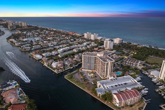 4740 S Ocean Blvd Unit 511, Highland Beach, FL 33487 - aerial view at dusk featuring a water view and a city view