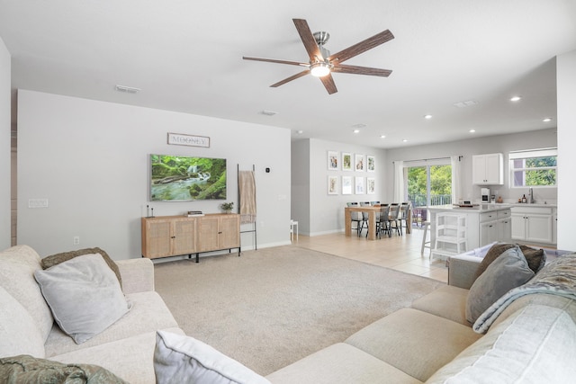 3625 Sapphire Hollow Way, Fort Pierce, FL 34981 - living area with visible vents, baseboards, ceiling fan, and recessed lighting