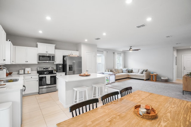 3625 Sapphire Hollow Way, Fort Pierce, FL 34981 - dining space with light tile patterned flooring, a ceiling fan, visible vents, and recessed lighting