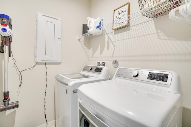 3625 Sapphire Hollow Way, Fort Pierce, FL 34981 - washroom featuring electric panel, laundry area, and washing machine and clothes dryer