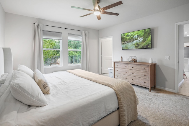3625 Sapphire Hollow Way, Fort Pierce, FL 34981 - bedroom with carpet floors, baseboards, and ceiling fan