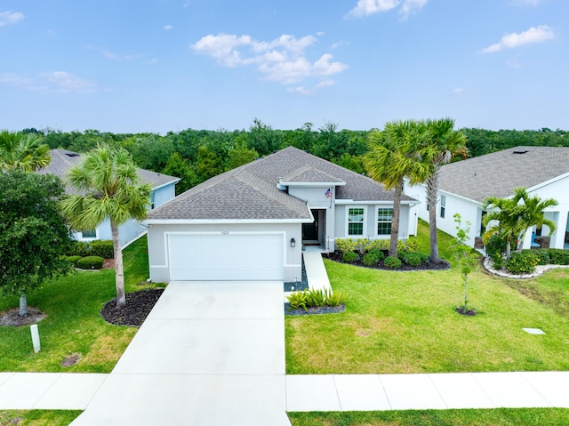 3625 Sapphire Hollow Way, Fort Pierce, FL 34981 - single story home featuring a garage, stucco siding, a shingled roof, a front yard, and driveway