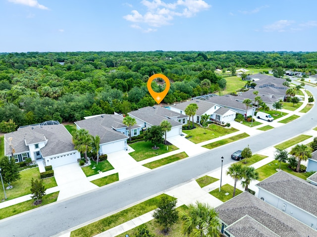 3625 Sapphire Hollow Way, Fort Pierce, FL 34981 - aerial view with a view of trees and a residential view