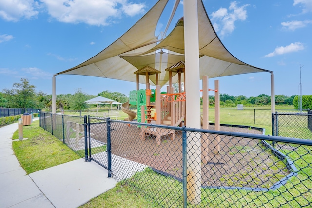 3625 Sapphire Hollow Way, Fort Pierce, FL 34981 - view of property's community featuring a gate, fence, and playground community