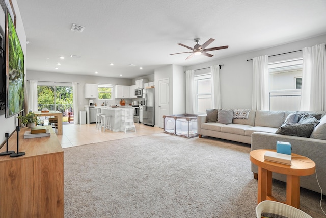 3625 Sapphire Hollow Way, Fort Pierce, FL 34981 - living area featuring a ceiling fan, light carpet, visible vents, and recessed lighting
