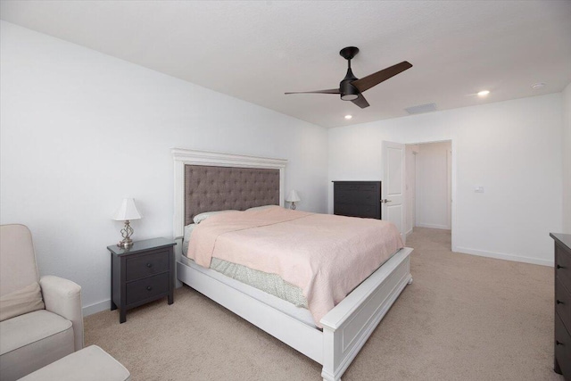 bedroom with light colored carpet, a ceiling fan, baseboards, and recessed lighting