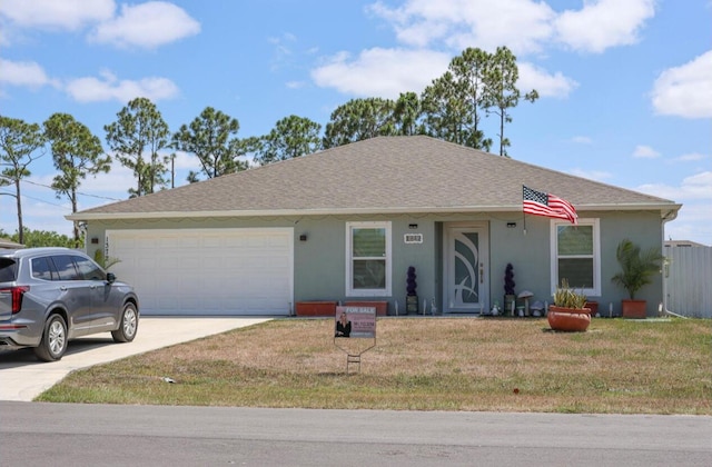 ranch-style home featuring a garage, a front lawn, and stucco siding