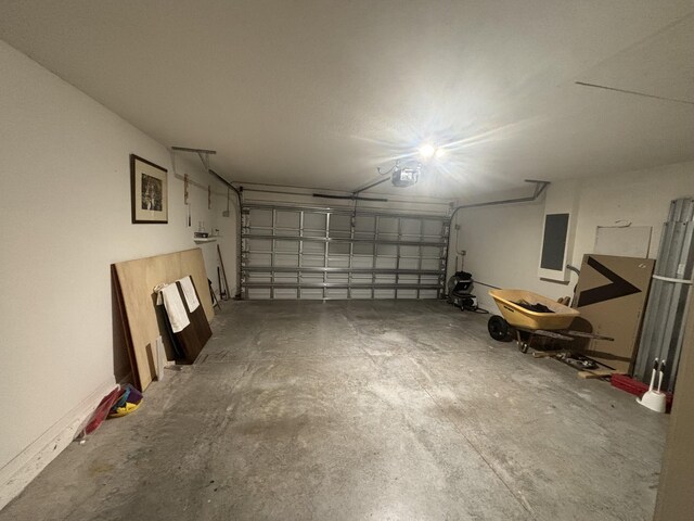 1372 SW Babcock Ave, Port Saint Lucie, FL 34953 - garage with electric panel and a garage door opener