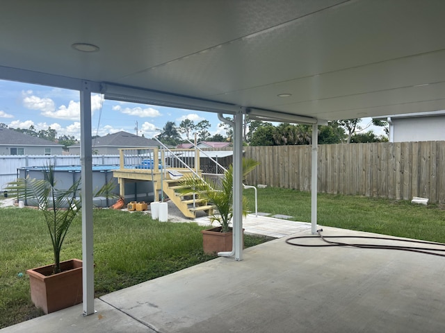 1372 SW Babcock Ave, Port Saint Lucie, FL 34953 - fenced backyard with a patio and a residential view