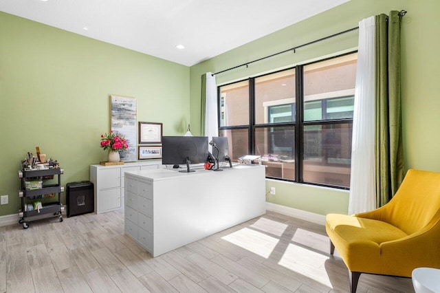 office with recessed lighting, baseboards, and light wood-type flooring