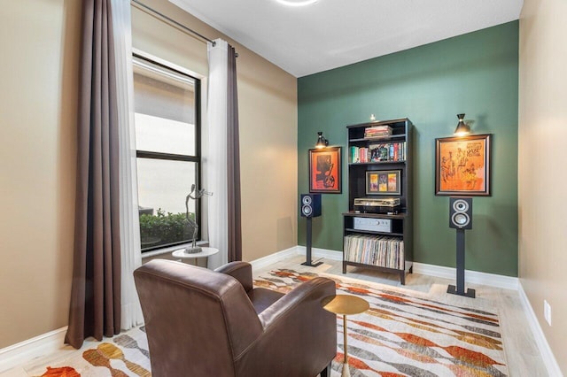 sitting room featuring baseboards