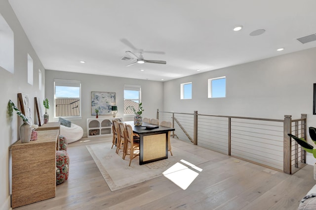dining space with visible vents, a ceiling fan, wood finished floors, and recessed lighting