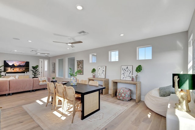 dining space with recessed lighting, a ceiling fan, visible vents, and light wood finished floors