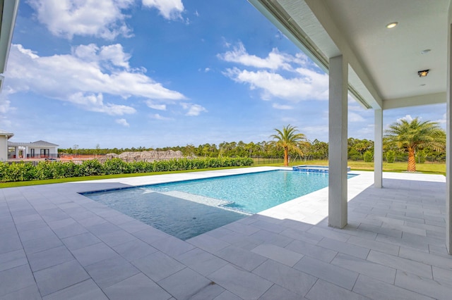 pool with a patio area