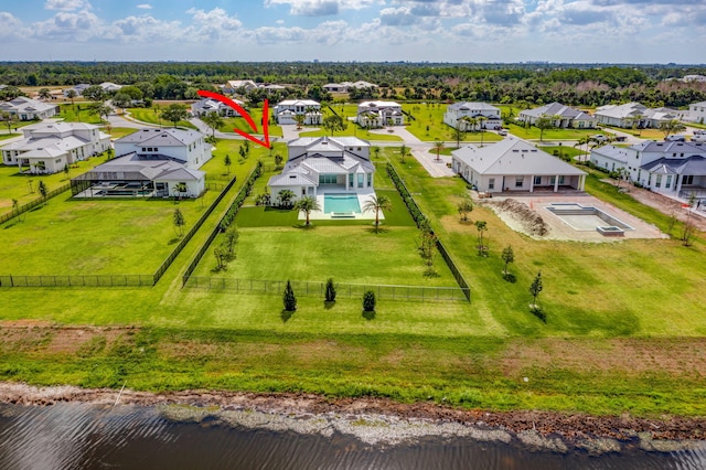 aerial view with a residential view and a water view
