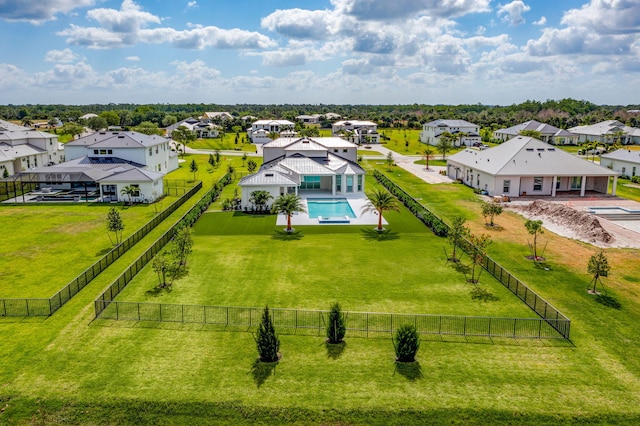 birds eye view of property with a residential view