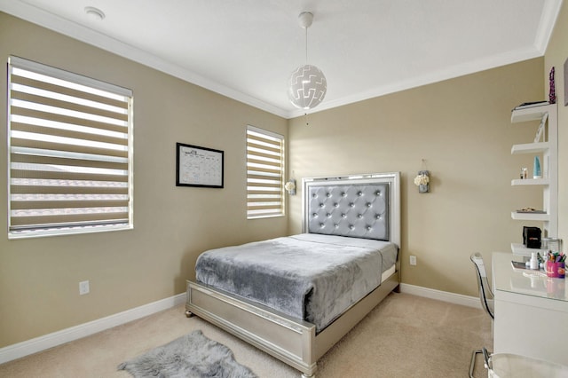 bedroom with crown molding, baseboards, and light carpet