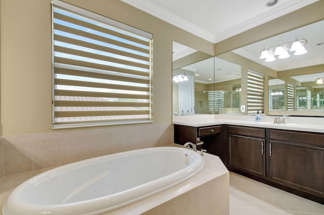 full bath featuring crown molding, vanity, a garden tub, and tile patterned floors