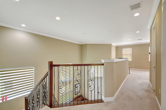 corridor featuring carpet floors, recessed lighting, baseboards, an upstairs landing, and visible vents
