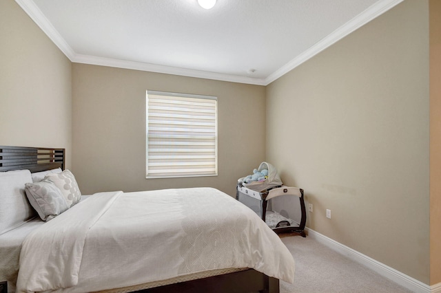 bedroom featuring crown molding, baseboards, and light colored carpet