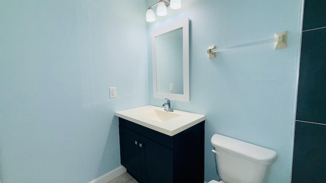 1942 SE Carvalho St, Port Saint Lucie, FL 34983 - bathroom featuring vanity and toilet
