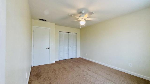 1942 SE Carvalho St, Port Saint Lucie, FL 34983 - unfurnished bedroom with visible vents, carpet flooring, baseboards, and a closet