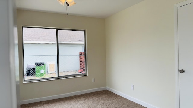 1942 SE Carvalho St, Port Saint Lucie, FL 34983 - carpeted spare room featuring plenty of natural light, a ceiling fan, and baseboards