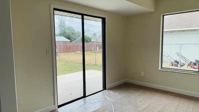 1942 SE Carvalho St, Port Saint Lucie, FL 34983 - interior space featuring baseboards and carpet