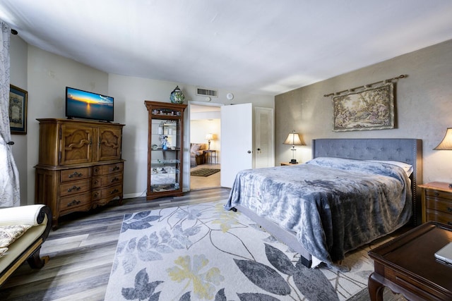 3800 Washington Rd Unit 1002, West Palm Beach, FL 33405 - bedroom with wood finished floors