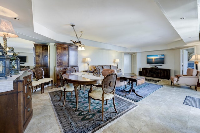 3800 Washington Rd Unit 1002, West Palm Beach, FL 33405 - dining room featuring a tray ceiling