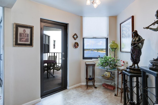 3800 Washington Rd Unit 1002, West Palm Beach, FL 33405 - tiled entrance foyer with baseboards