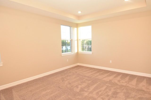 12546 Triumph Ln, Palm Beach Gardens, FL 33412 - carpeted spare room with recessed lighting, baseboards, and a raised ceiling