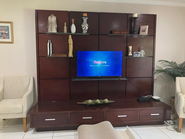 21365 Cypress Hammock Dr Unit 20G, Boca Raton, FL 33428 - living room with tile patterned floors