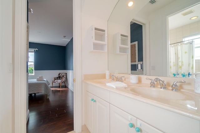 4510 Island Reef Dr, Wellington, FL 33449 - bathroom with visible vents, a sink, and a healthy amount of sunlight