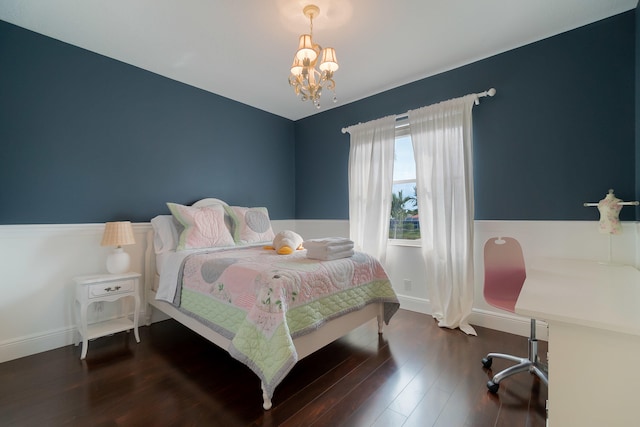 4510 Island Reef Dr, Wellington, FL 33449 - bedroom with baseboards, an inviting chandelier, and wood finished floors
