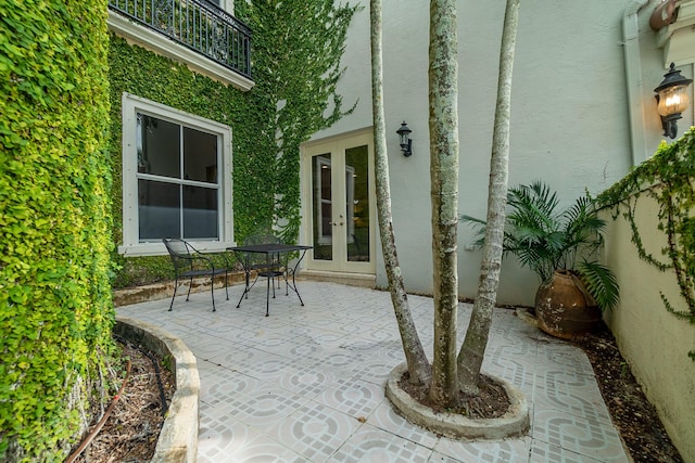 4510 Island Reef Dr, Wellington, FL 33449 - view of patio / terrace with french doors and a balcony